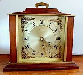 ATTRACTIVE VINTAGE ENGLISH DOMINION CLOCK,WOOD AND BRASS,SOLID.