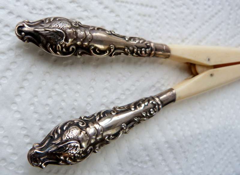 ANTIQUE ORNATE ca 1900 GLOVESTRETCHER.  BONE AND STERLING SILVER