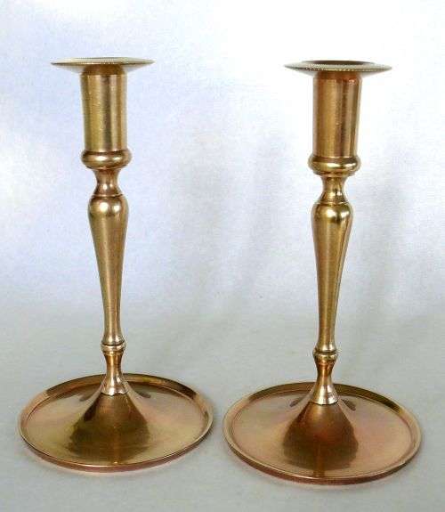 A PAIR OF SOLID  BRASS CANDLESTICKS