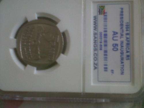 RARE GRADE.AU 50 1994 inauguration R5 coin