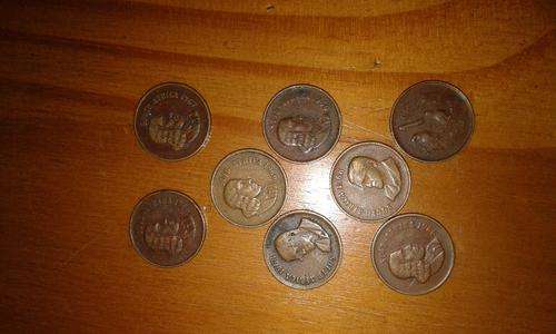 ONE BID FoR ALL EIGHT 1960s one cent coins