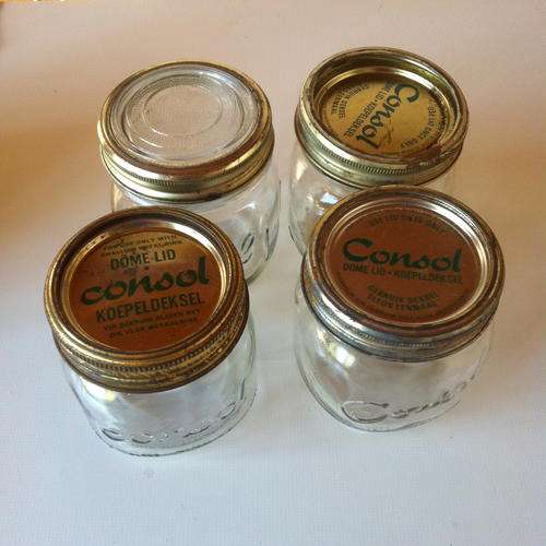 FOUR VINTAGE CONSOL JARS (SMALL)