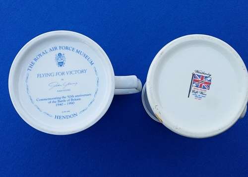 Two Tankards. One is Stoke-on-Trent and the other is a commemorative one. Good condition