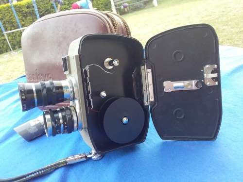 Sankyo 8T Camera with light meter, unopened roll of colour movie film and bag. Please read descrip
