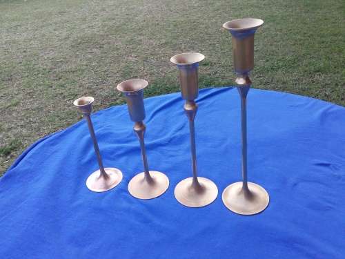 4 Brass candle sticks