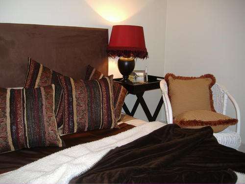 Headboard upholstered in seudette fabric