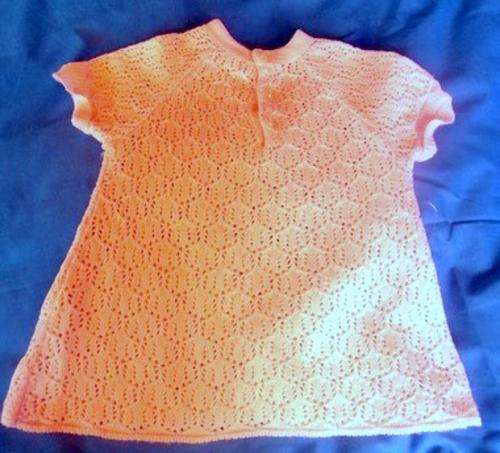 A STUNNING HAND MADE PINK BABY DRESS