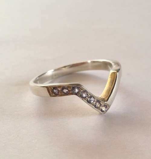 0.11ctw Tanzanite Wishbone Style Ring in Silver- Size N