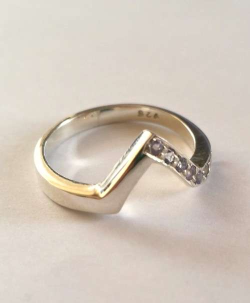 0.11ctw Tanzanite Wishbone Style Ring in Silver- Size N