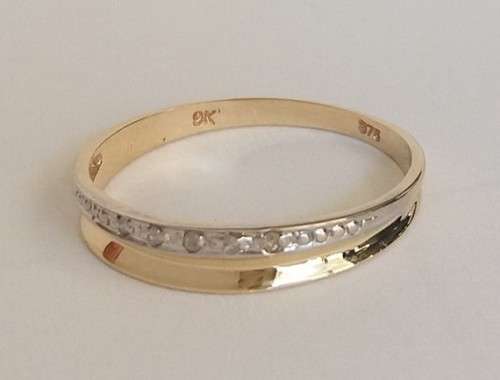 Natural diamond band in 9K yellow gold