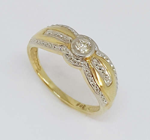 0.14ct Diamond ( EGL Certified) Ring in 9K Yellow Gold