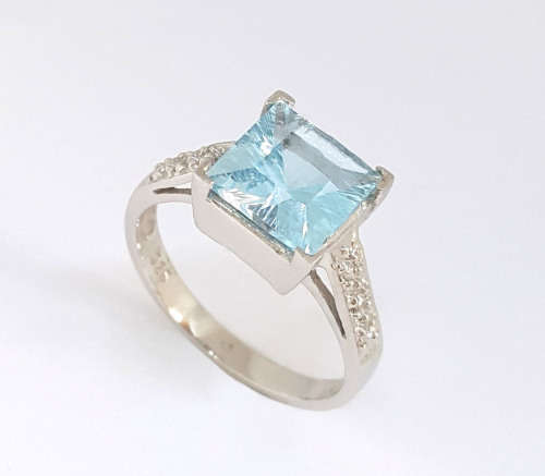 *CD DESIGNER JEWELRY* Blue Topaz and CZ Ring in Silver- Size 6