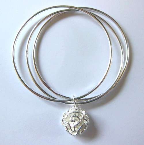 3 Bangles with Flower Like Charm