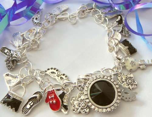 Silvertone Charm Bracelet with Ice Skate, Shoe and Glove type Charms