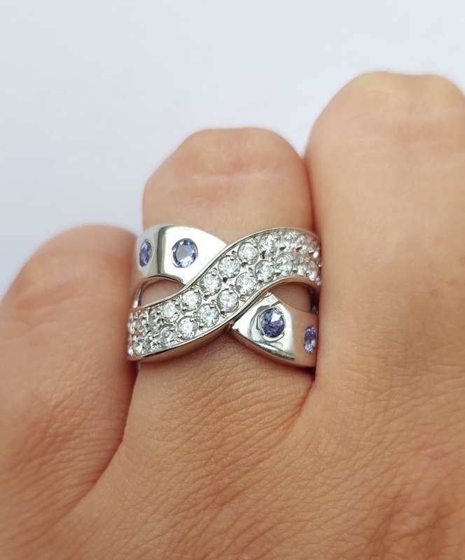 *CD DESIGNER JEWELRY* 1.30ctw Cr Tanzanite and CZ Cross over Ring- Size R
