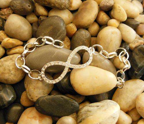 Rhinestone Infinity Silvertone bracelet