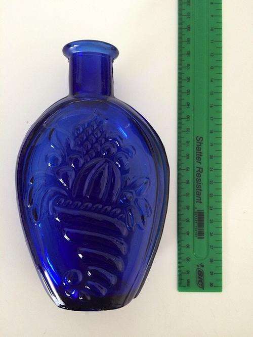 Decorative blue glass bottle
