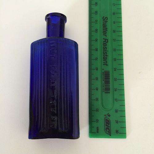 Decorative blue glass bottle