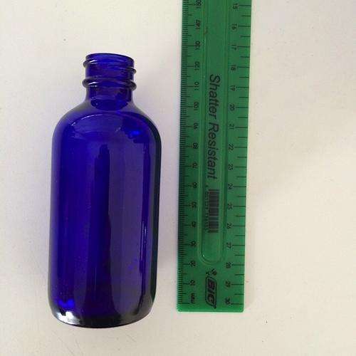 Decorative blue glass bottle
