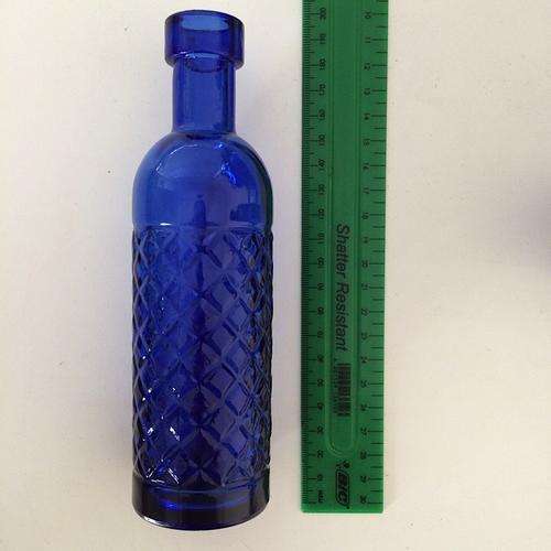 Decorative blue glass bottle