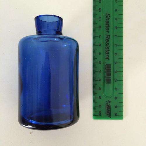 Small blue glass vase