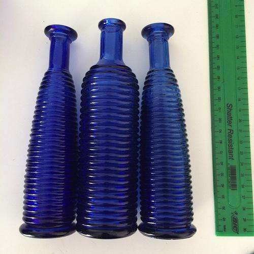 Set of 3 blue glass vases