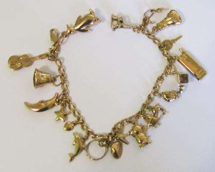 9ct Solid Yellow Gold 20 Charms Bracelet - 16 Grams