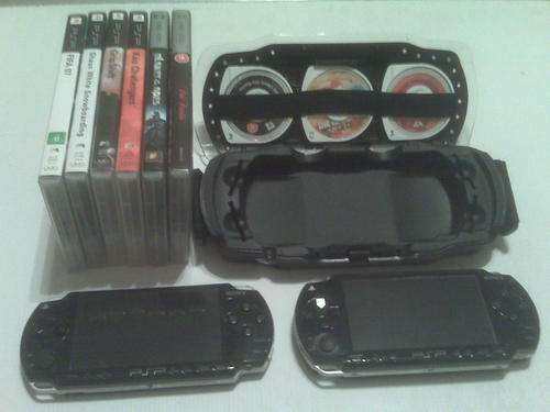2 PSP consoles with games & movies