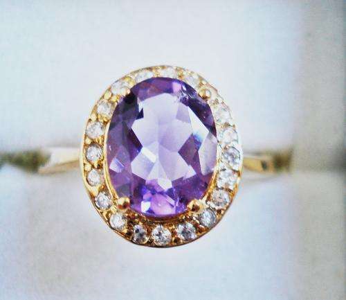 MAGNIFICENT AMETHYST AND WHITE SAPPHIRE RING SET IN GOLD PLATED .925 STERLING SILVER