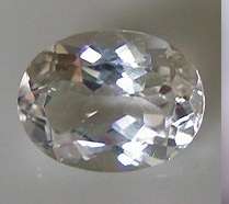 GLITTERING OVAL WHITE TOPAZ  - BRAZIL.   5.54CT