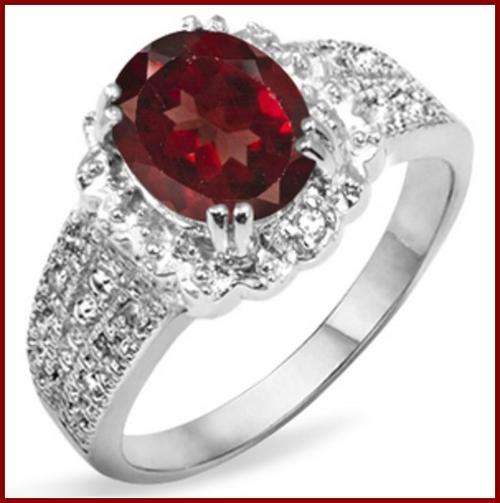 BEAUTIFUL  GARNET AND DIAMOND RING SET IN .925 STERLING SILVER / W.PLATINUM