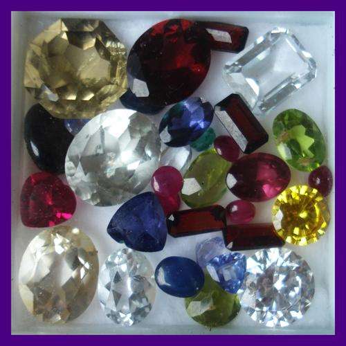 BEAUTIFUL  SET OF 33.97  CT MIXED GEMS PERIDOT,TOPAZ STAR SAPPHIRE LEMON QUARTZ RUBIES ETC