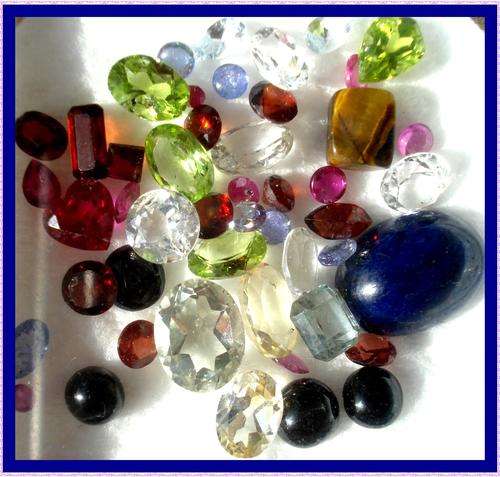 STUNNING  LOT OF MIXED GEMSTONES 32.39CT  GARNETS,RUBIES ETC SEE DETAILS