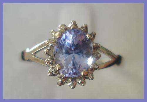 STUNNING TANZANITE AND DIAMOND RING SET IN 10CT WHITE GOLD SIZE 7