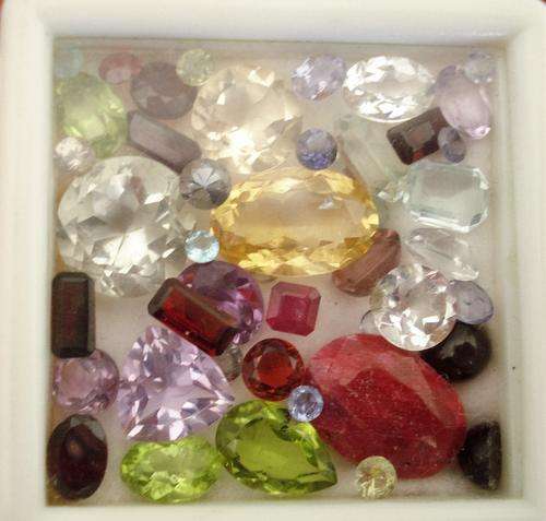 AWESOME LOT OF MIXED GEMS 33.52 CT - TOPAZ, RUBY AMETHYSTS ETC