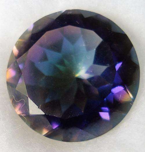 STUNNING RAINBOW MAGIC QUARTZ - 12.7CT   ROUND