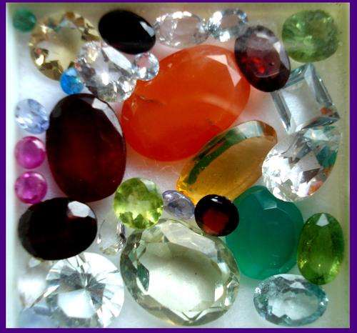 AWESOME LOT OF MIXED GEMS 33.72 CT -  topaz  peridot  aquamarine etc etc