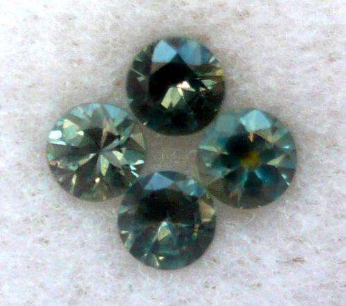 SET OF 4 ROUND BRILLIANT CEYLON SAPPHIRES! TEAL BLUE-GREEN.   1.12 CTS .