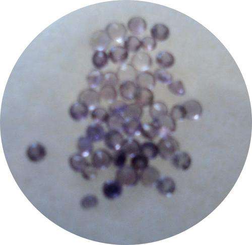 APPROX 48 SMALL ROUND AMETHYSTS VARIOUS SIZES - WEIGHT .74CT