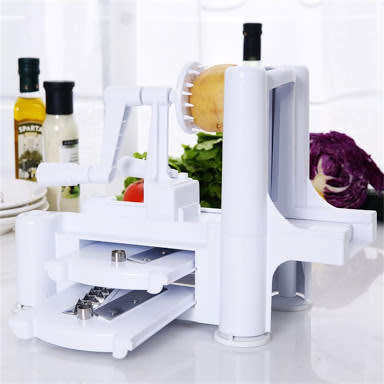 A spiralizer  it's  A kitchen  tool that easily makes noodles out of vegetable.