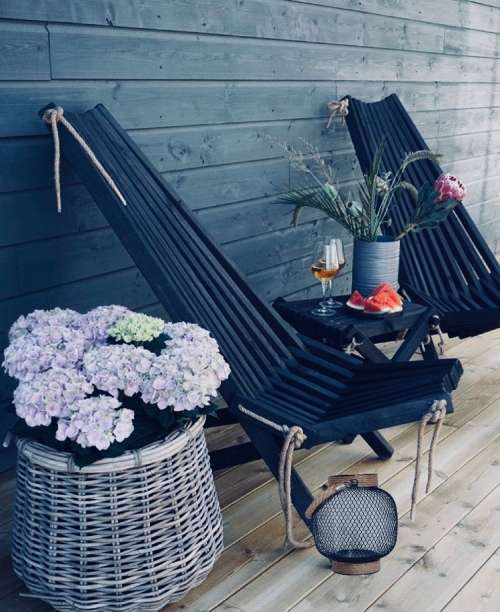 Outdoor lantern with glass candle holder inside