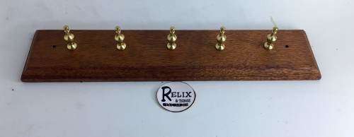 BRASS ON WOOD RACK