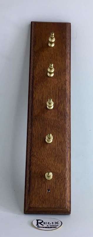 BRASS ON WOOD RACK