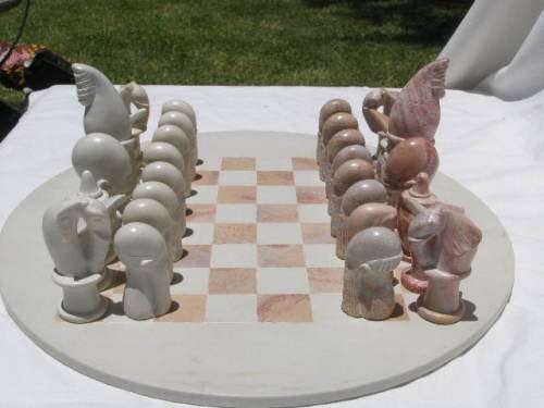 WOW! STUNNING CARVED STONE TRADITIONAL STYLE AFRICAN CHESS SET