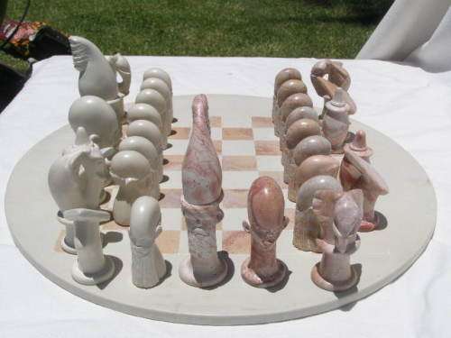 WOW! STUNNING CARVED STONE TRADITIONAL STYLE AFRICAN CHESS SET