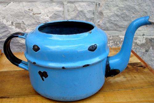 Vintage enamel teepot for decoration.
