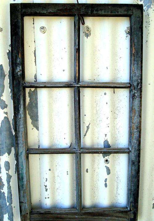 Rustic wooden window frame.
