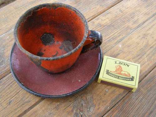 Vintage enamil cup and saucer