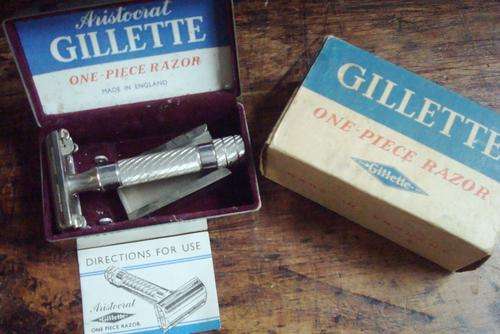 Vintage Gillett razor in Stainless tin with box.