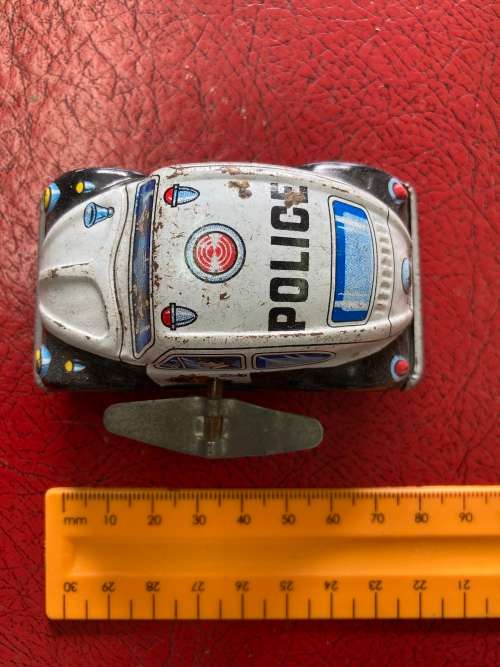 Tin police car - made in Japan possibly 1950s working winding mechanism
